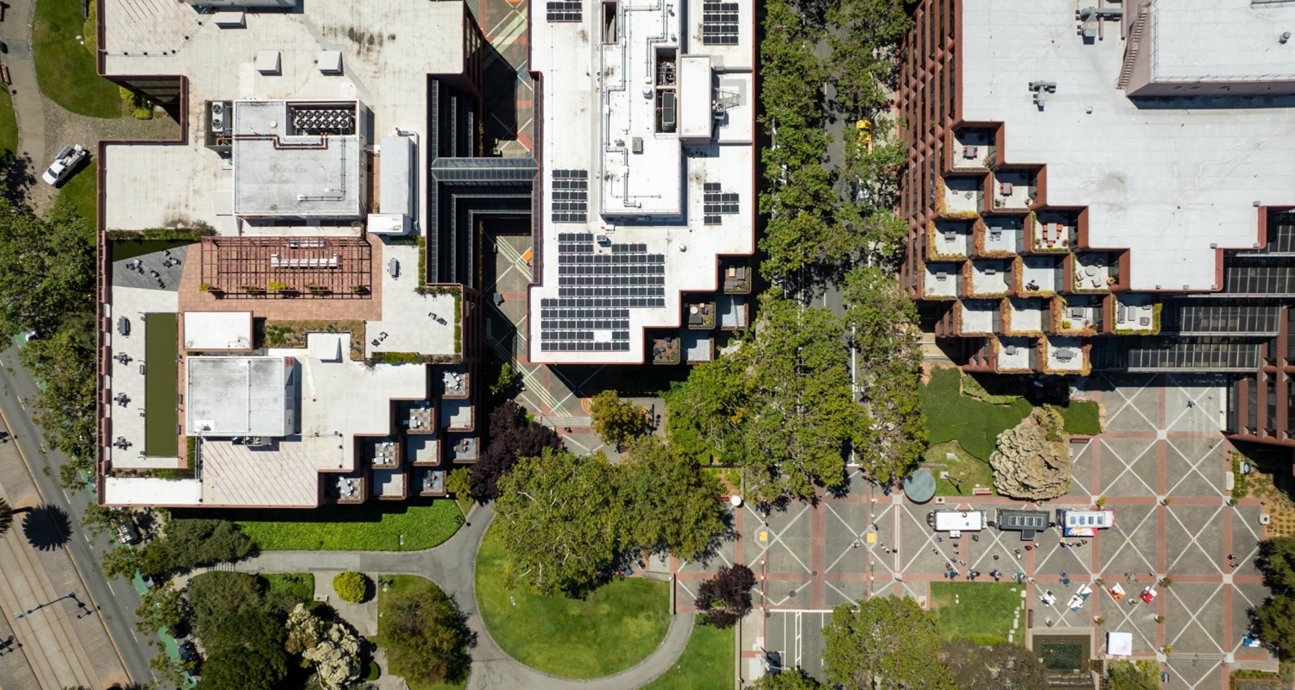 Aerial view looking down on the solar panels on the rooftop of a building at Levi's Plaza