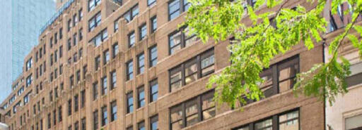 304 East 45th street building façade with other high-rise building in the background