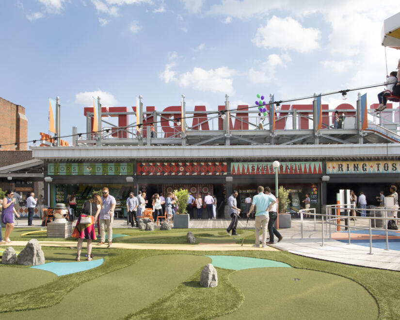 Rooftop of Ponce City Market with people enjoying the amusement park